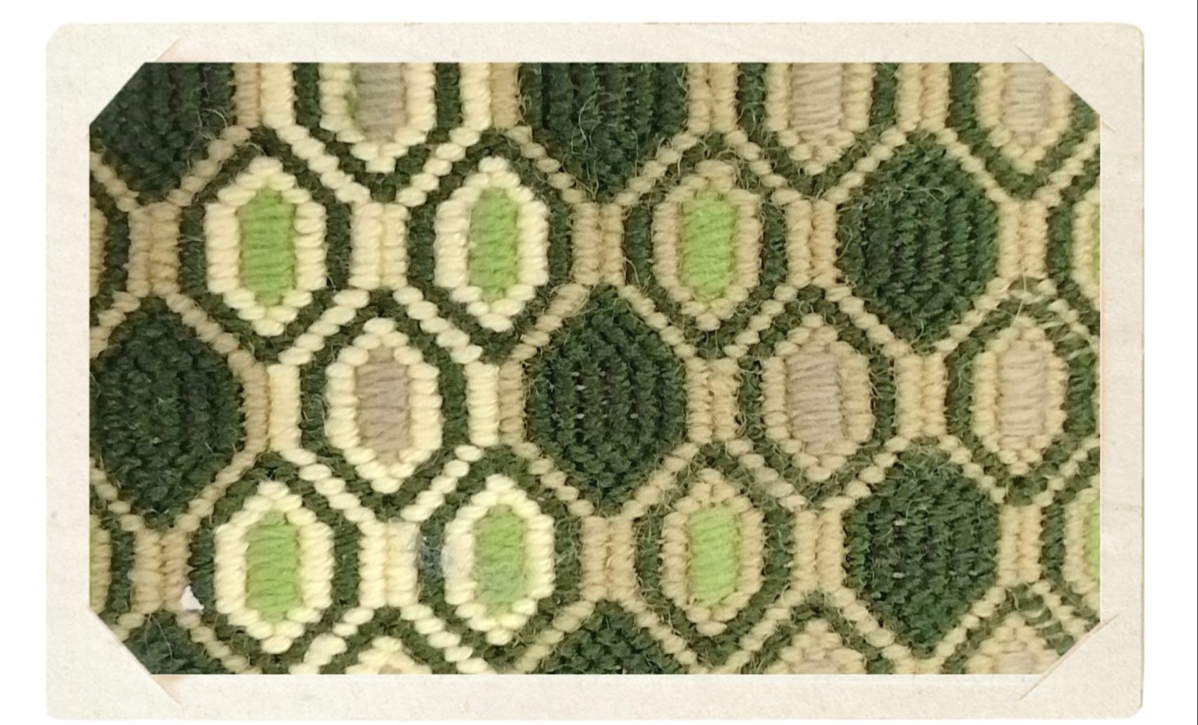 The picture shows examples of Bargello embroidery, with bright colours and striking geometric patterns.